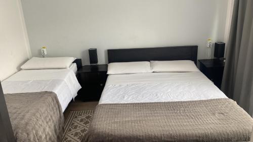 Postel nebo postele na pokoji v ubytování Casa Mocanitei