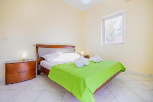 A bed or beds in a room at Pano's House