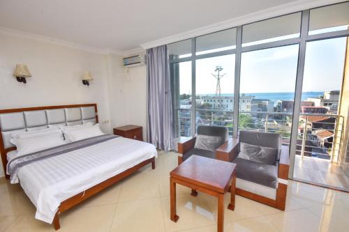 Postel nebo postele na pokoji v ubytování Hotel Chveni Sakhli