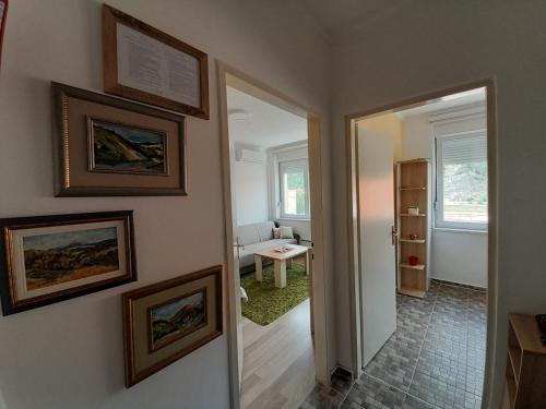 a hallway with a door leading to a room at Apartman Trg Višegrad in Višegrad