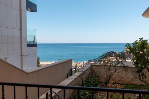 a view of the beach from a building at Porta Volta Residence in Becici