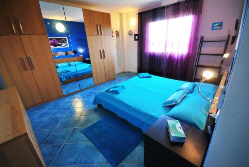 Postel nebo postele na pokoji v ubytování Holiday Residence Rifugio