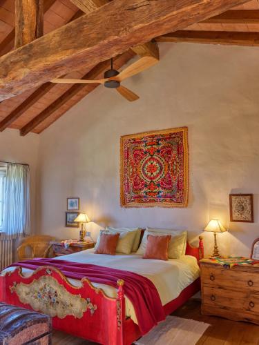 Postel nebo postele na pokoji v ubytování Il Castello di Tassara