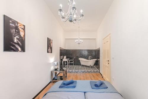 Una cama o camas en una habitación de Rezidence Znojmo