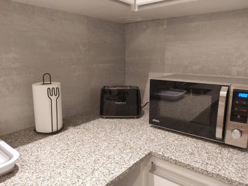 Una cocina o kitchenette en Departamento 1 Dormitorio Torre Quarz 902