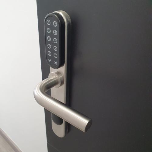 a close up of a door with a handle at CH Bueno in Madrid