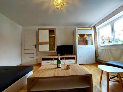 Una televisión o centro de entretenimiento en Panoramatický apartmán Tatry