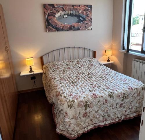 Postel nebo postele na pokoji v ubytování Casa Gellera Via Nottolini 119