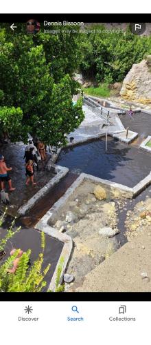 a picture of a pool of water with people in it at Desired View in Choiseul