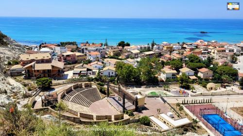an aerial view of a city and the ocean at Scala dei Turchi Apartment in Realmonte