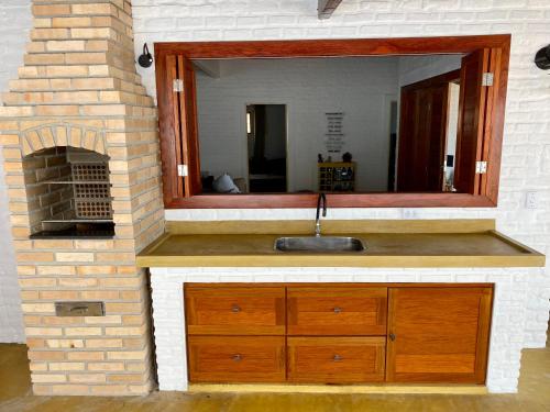 Ένα μπάνιο στο Casa Pé na Areia Maracajau