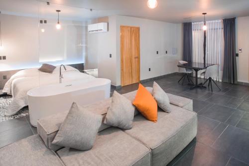 Postel nebo postele na pokoji v ubytování Casa Tilmacalli Hotel Boutique