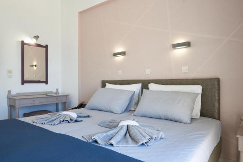 Postel nebo postele na pokoji v ubytování HOTEL ATHINA