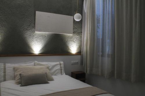 Postel nebo postele na pokoji v ubytování La Cúpula