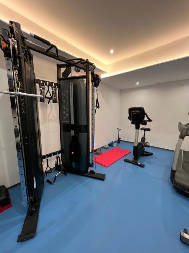 a room with a gym with two tread machines at Villa Žnjan in Split