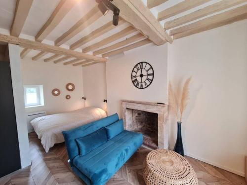 Posteľ alebo postele v izbe v ubytovaní Appartement Centre ville de Bayeux