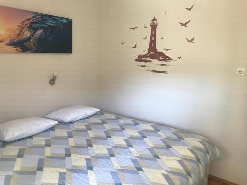 Posteľ alebo postele v izbe v ubytovaní Apartman Flora's Garden
