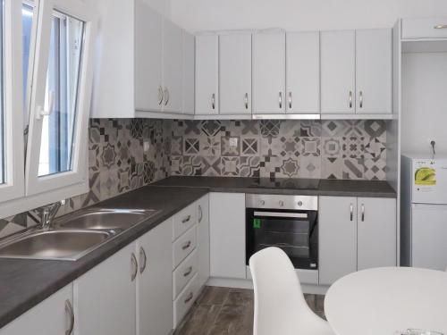 Una cocina o zona de cocina en Papillon