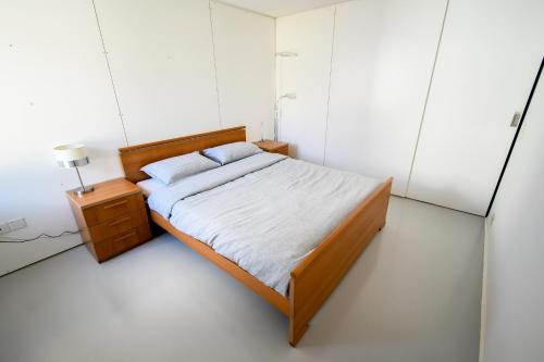 Postel nebo postele na pokoji v ubytování Splendido appartamento a due passi da Locarno