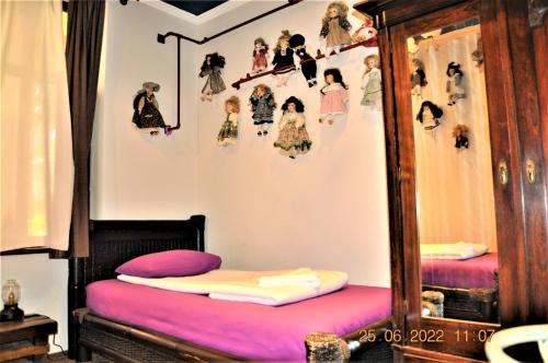 a bedroom with a bunk bed and a mirror at Social Guest House in Sofia