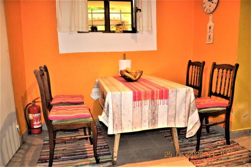 a dining room with a table and two chairs at Social Guest House in Sofia