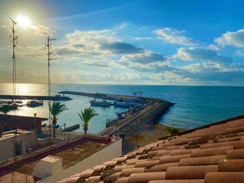 a view of the ocean from a building at Chez Marina in Les Cases d'Alcanar