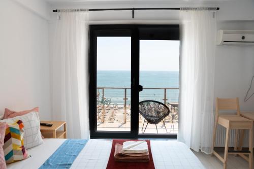 Giường trong phòng chung tại Yaio apartments