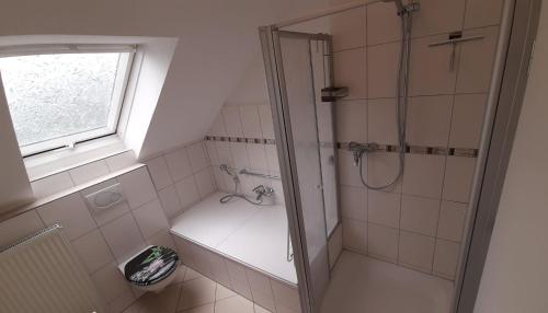 Ванная комната в Ferienwohnung Onkel Willi