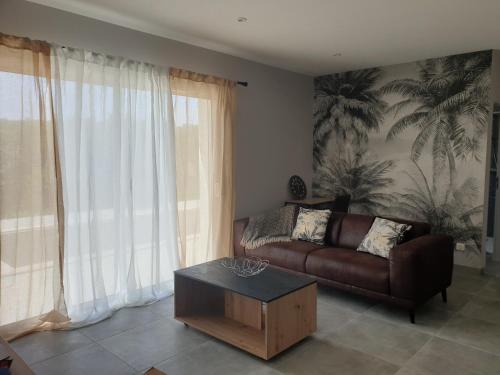 Posezení v ubytování Gite des Clapas Flora, villa avec piscine privée