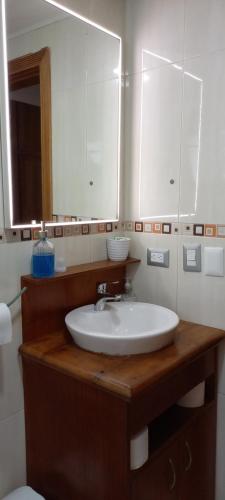 a bathroom with a sink and a mirror at Suite just over the beach-Adults only in Punta Cana