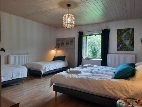 Katil atau katil-katil dalam bilik di Chez La Léa