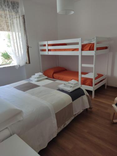 A bed or beds in a room at B&B A casa di Carla
