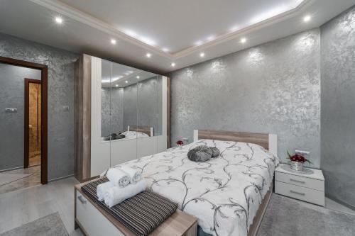 Ένα ή περισσότερα κρεβάτια σε δωμάτιο στο City Apartments - a brand new luxury & comfy.