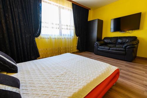 TV a/nebo společenská místnost v ubytování Guest House Dinaya