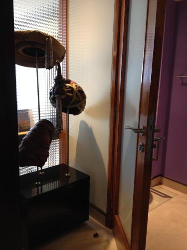 a room with a room with a mirror and a door at Blue Diamond Pune IHCL SeleQtions in Pune