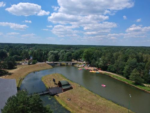 an aerial view of a river with boats in it at Domek -Radawa-Królewska 77b,domek Dorota in Radawa
