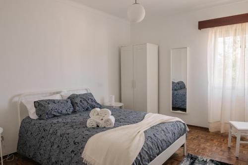 Ένα ή περισσότερα κρεβάτια σε δωμάτιο στο Casa Ti Carolina