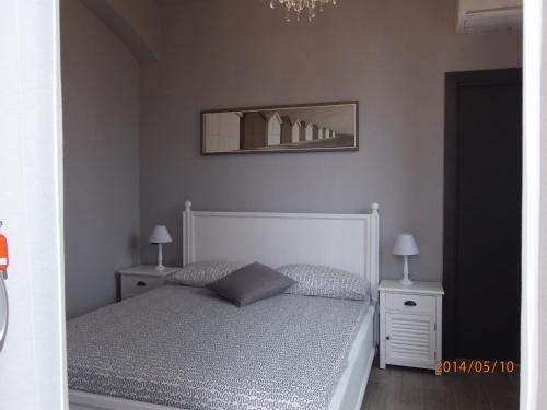 Ένα ή περισσότερα κρεβάτια σε δωμάτιο στο Casa Vacanze SanGiacomo Corallo