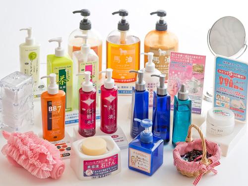a group of cleaning products sitting on a counter at Kameyama Onsen Hotel in Kimitsu
