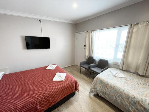 Katil atau katil-katil dalam bilik di Hillview Motel
