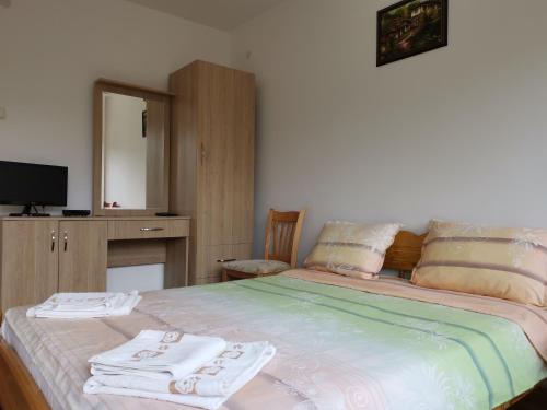 Ένα ή περισσότερα κρεβάτια σε δωμάτιο στο Guest House Milka