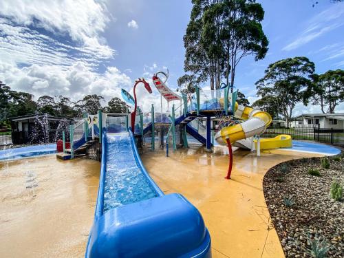 a water park with a water slide and a water slide at Discovery Parks - Eden in Eden