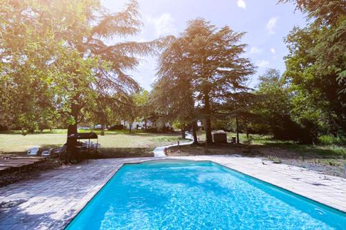 The swimming pool at or close to Karma Chateau de Samary