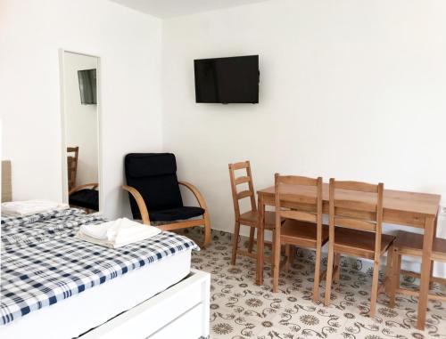 TV a/nebo společenská místnost v ubytování Nest Apartman