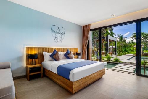 En eller flere senge i et værelse på Villa Noi by BaliSuperHost