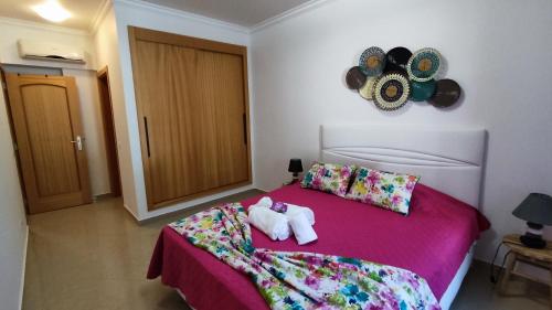 Postel nebo postele na pokoji v ubytování 5B Sra da Rocha - Casas & Papeis