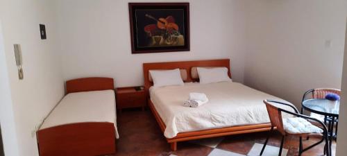 Postel nebo postele na pokoji v ubytování Villa Lutovac Budva