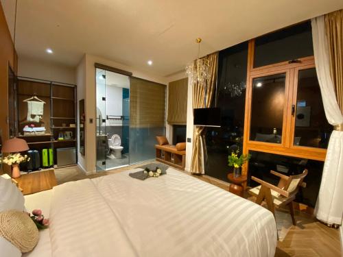 Katil atau katil-katil dalam bilik di Teakhouse Đà Lạt