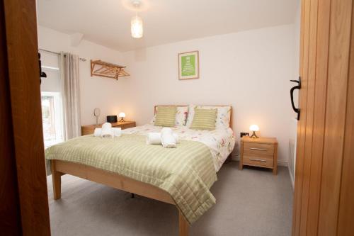 Voodi või voodid majutusasutuse Cottage - Sleeps 4 - Garden - Parking toas