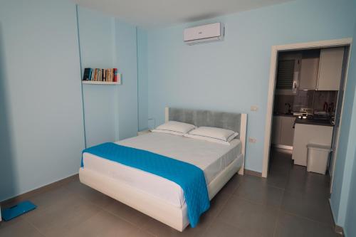 Postel nebo postele na pokoji v ubytování Vila&Apartments Kadare
